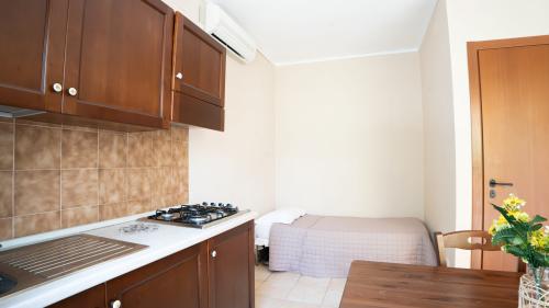 6_bilo3_cucina_e_e_letto